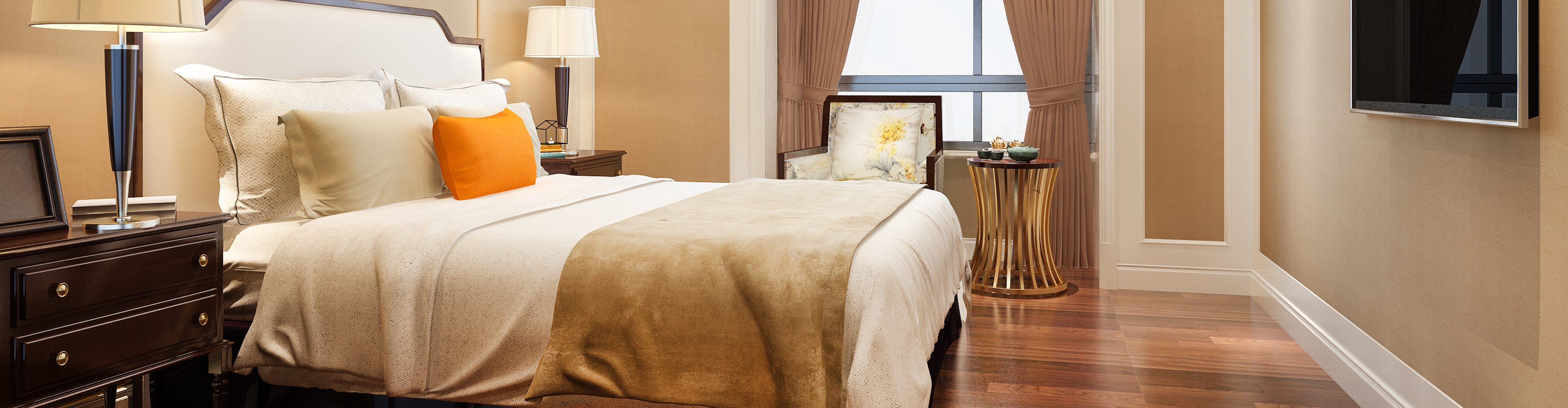 Hotel guest room with made bed and bedside tables