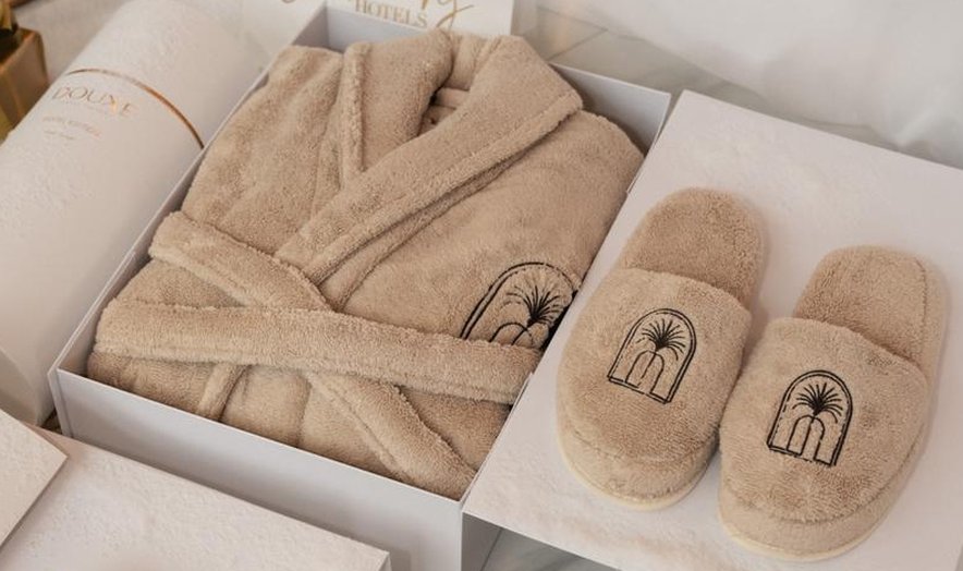 Beige robe and embroidered slippers presented in a gift box