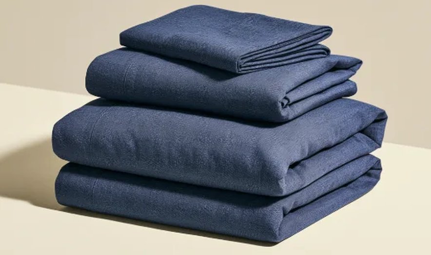 Stack of folded navy linens